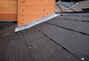 Beneath tile roofing, 30-pound roofing felt on a plywood deck sheds the water.