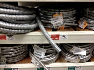 Flexible conduit provides a protective sleeve for electrical wires.
