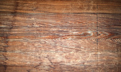 Reclaimed wood floors are loaded with natural character. Photo: Clay Gilpin | Dreamstime
