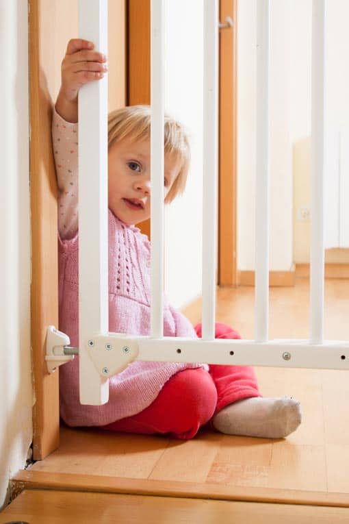 A secure baby gate can prevent little ones from trying to navigate up or down a staircase.