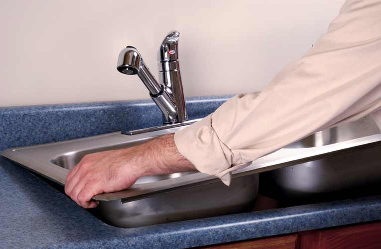 installing new kitchen waste floor sink in existing space