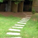 concrete paving stones and grass