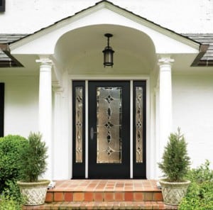 A classic front entrance offers inviting approach and beautiful detailing. Photo: Therma-Tru