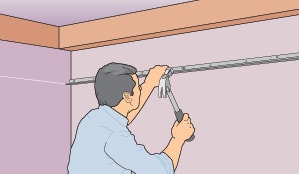 Attach L-shaped support tracks along level line on the walls.