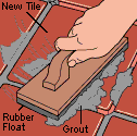 applying grout to tile