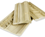3 boards of wooden ornate moldings over a white background.
