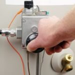 adjusting water heater dial