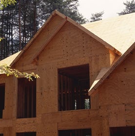 House’s exterior including walls with plywood sheathing.