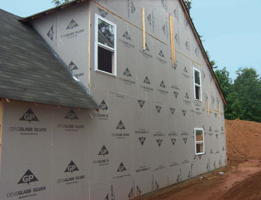 House’s exterior including walls with gypsum board sheathing.