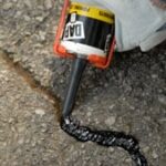 caulking asphalt driveway crack