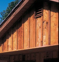 Wooden board-and-batten siding on a gable wall. 