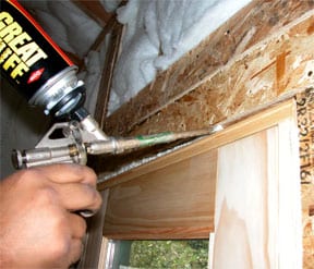 Expanding foam caulk feels large gap between framing and door frame.