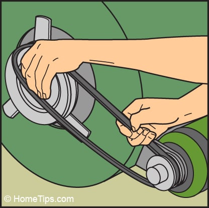 Diagram of hands fitting a new motor pulley onto a furnace motor.