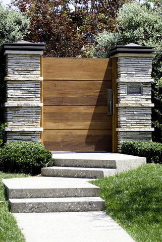 wooden gate stone pillars