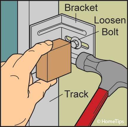 adjust garage door track