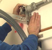 installing a garage door opener spring