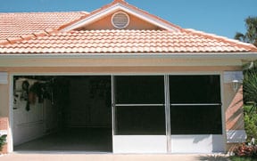 garage door opening protected by large screen door panels