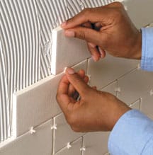 photo of setting wall tiles