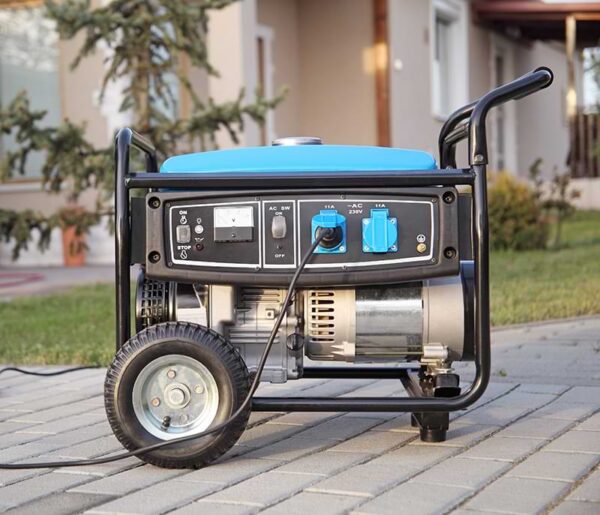 A portable generator plugged in outside a home