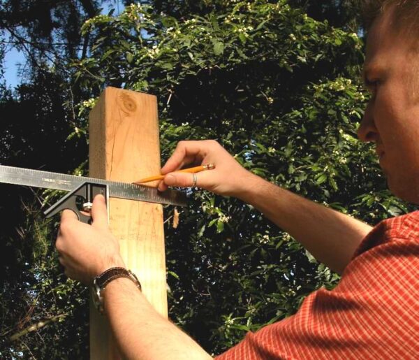 combination square to mark a cutting line around the post.