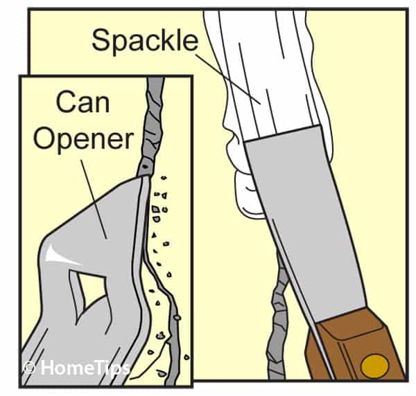 Cracked wall widened with a lever-type can opener’s tip including spackled paste applied into.