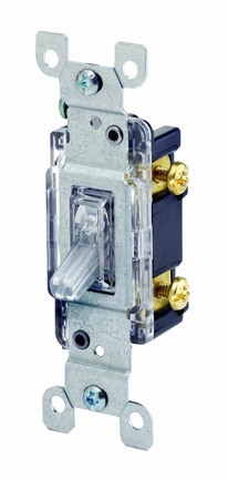 A clear single-pole, illuminated handle light switch.