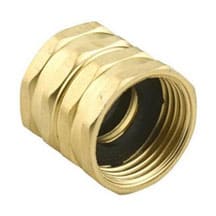 A brass double-female hose coupler on a white background.