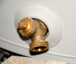 A brass water heater drain valve.