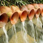 spill fountain water feature made of pots