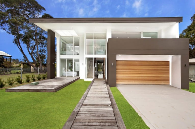 contemporary house wood path garage door