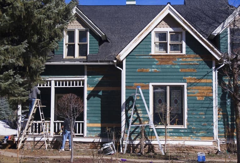 siding repair on Victorian house