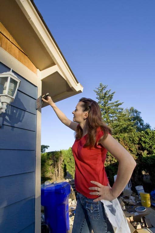 painting lap siding with brush