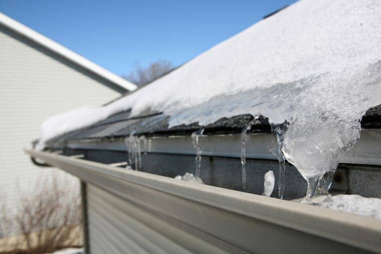 Ice dams cause water to back up the roof and leak underneath the shingles.