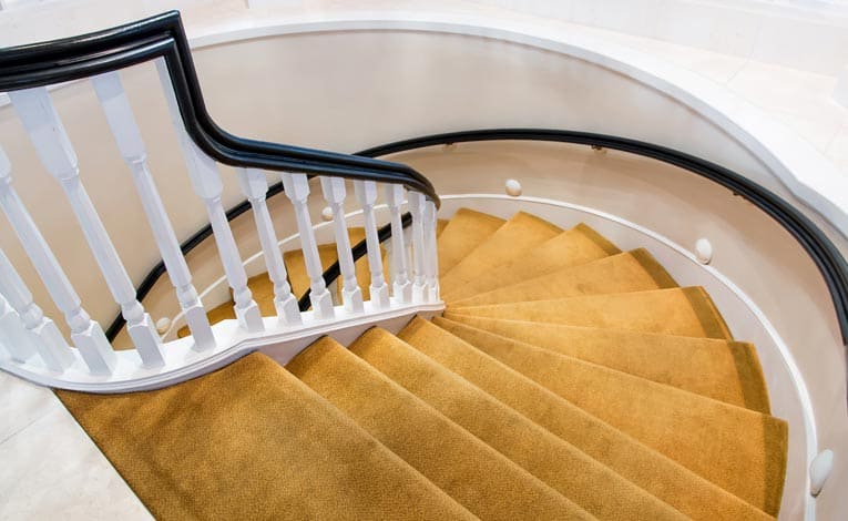 carpeted circular staircase