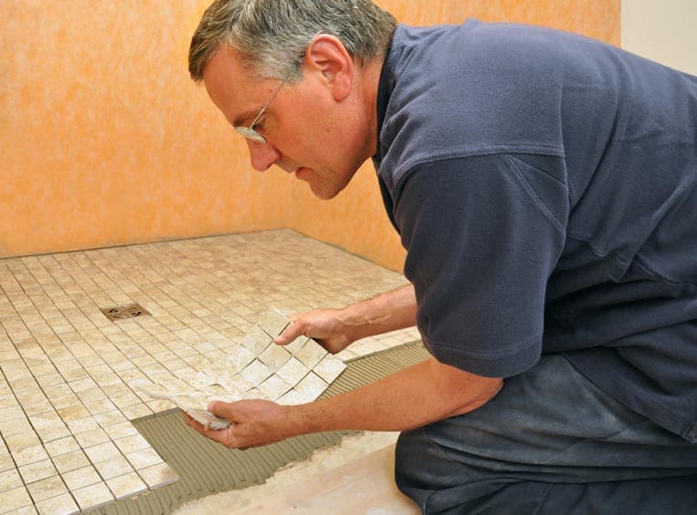Installing mosaic tile Ona natural tile tapware installation