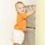 baby at child safe baby gate