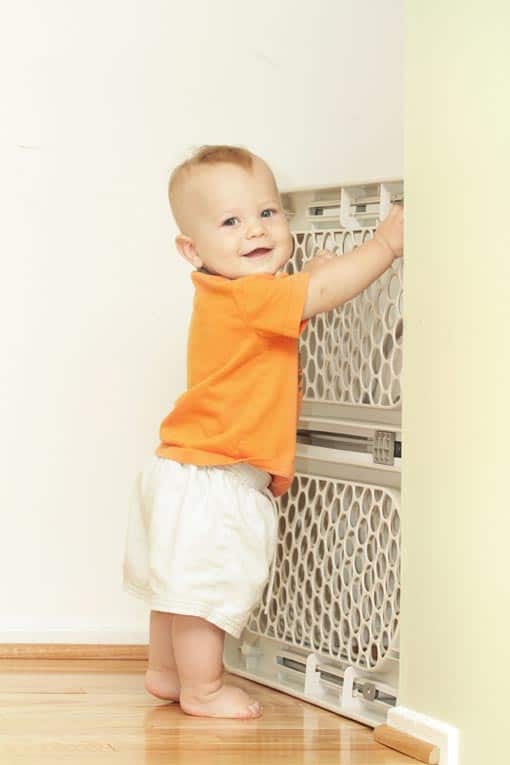 baby at child safe baby gate