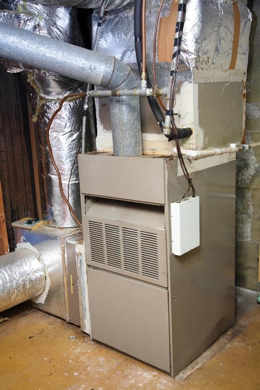 old gas furnace with ductwork