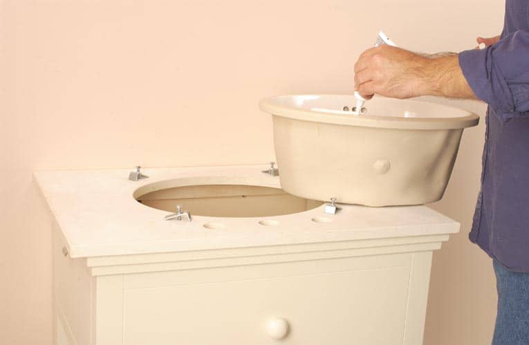 How To Install A Bathroom Sink Hometips, How To Install Above Counter Bathroom Sink