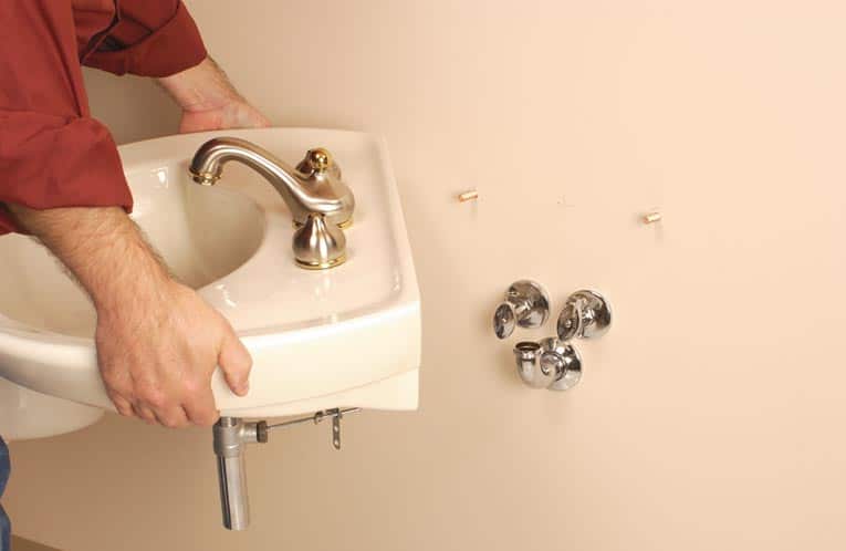 How To Install A Wall Mounted Sink Hometips - Installing Wall Mounted Bathroom Sink