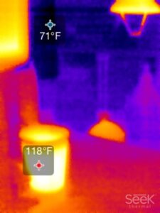 A thermal camera view including a temperature display in two different areas.