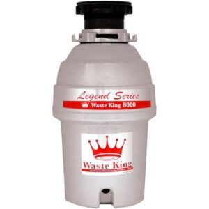 A continuous feed Waste King garbage disposer, over a white background.