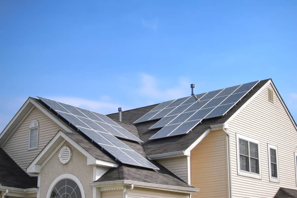 Photovoltaic (PV) solar panels on house roof