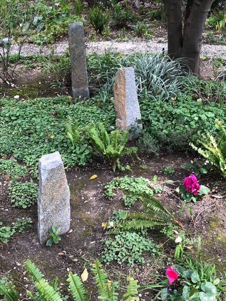 tall vertical stones in garden