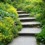 Smooth-cut flagstone stairs leading through a lush garden.