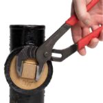 channel lock pliers tighten plug on cleanout