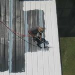 spray painting metal roof