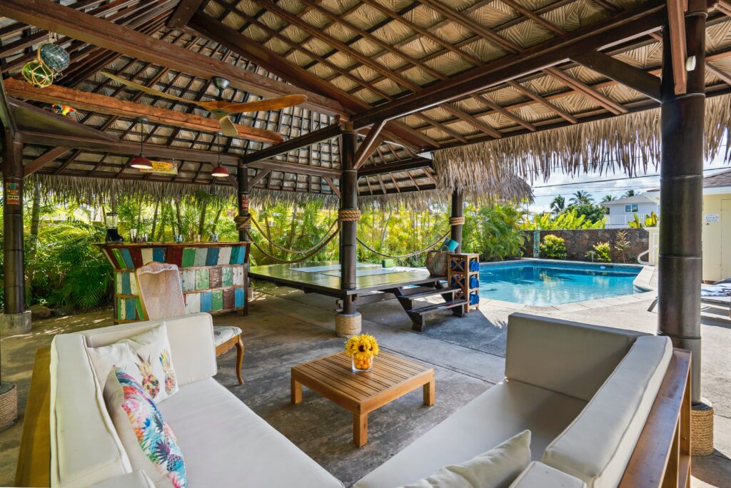 Island-style thatched roof over patio