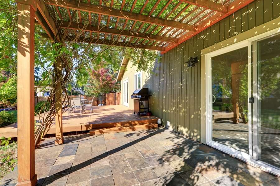 wood pergola attached to house