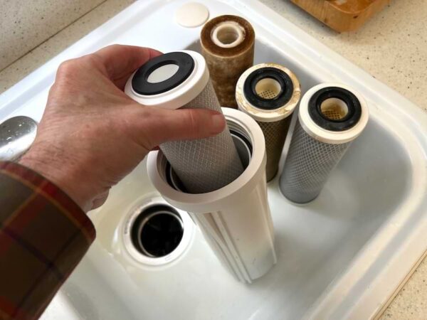 Replace the dirty water pre-filters with new ones